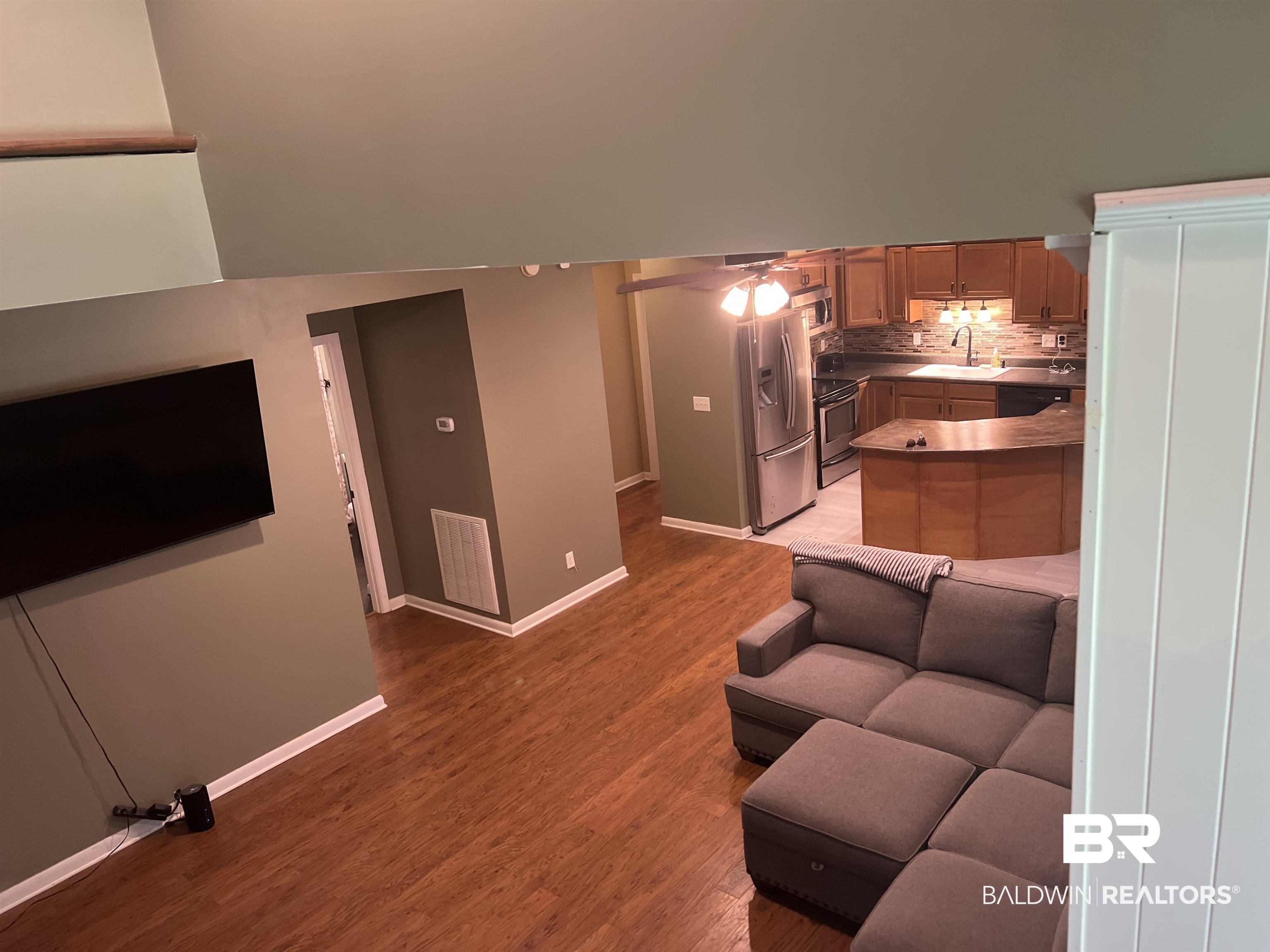 102 Brown Road Evergreen, AL 36401 - Photo 15 of 26 Living area featuring light wood finished floors and ceiling fan