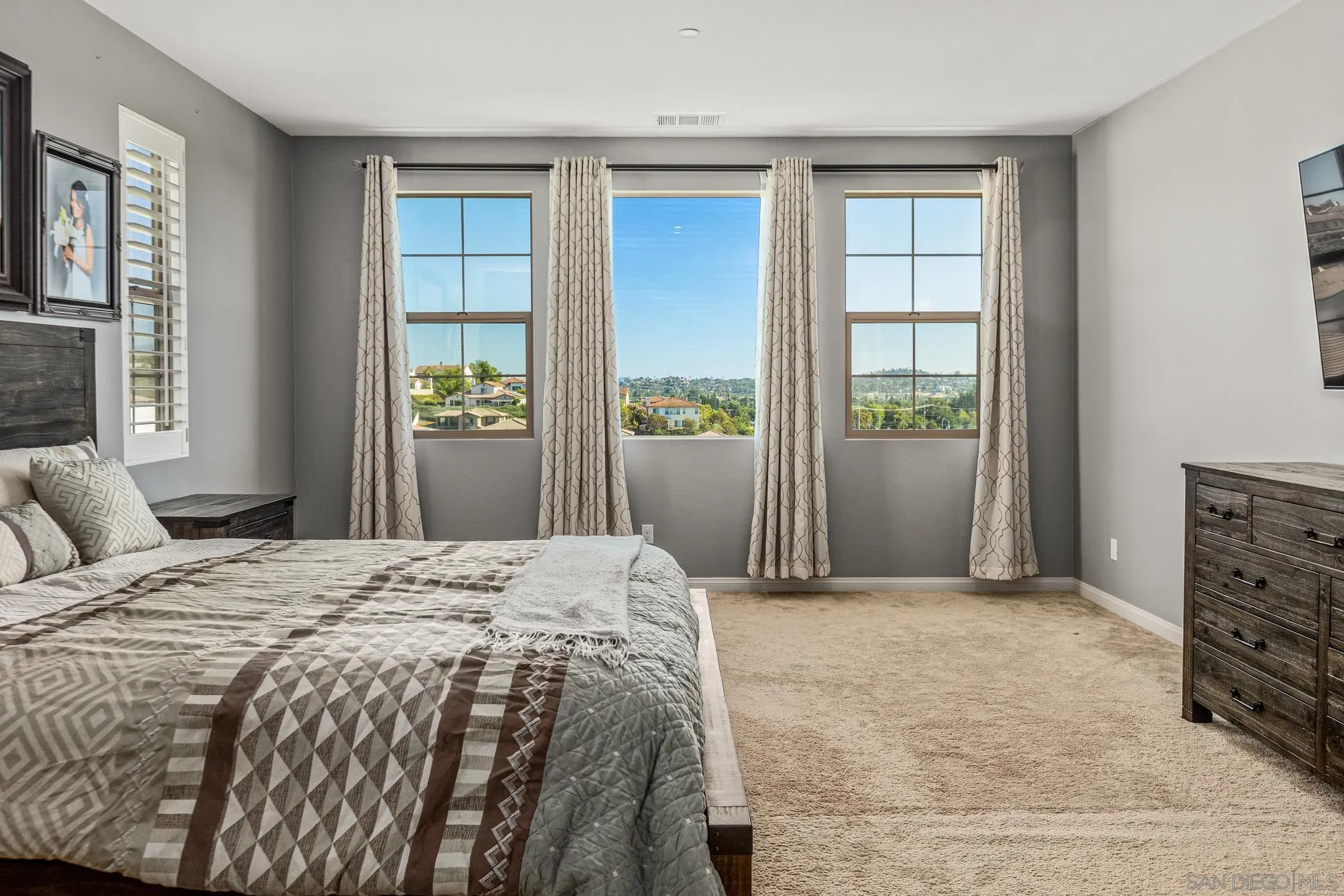 2401 Monroe Place Escondido, CA 92027 - Photo 16 of 23 a bedroom with a bed and a window