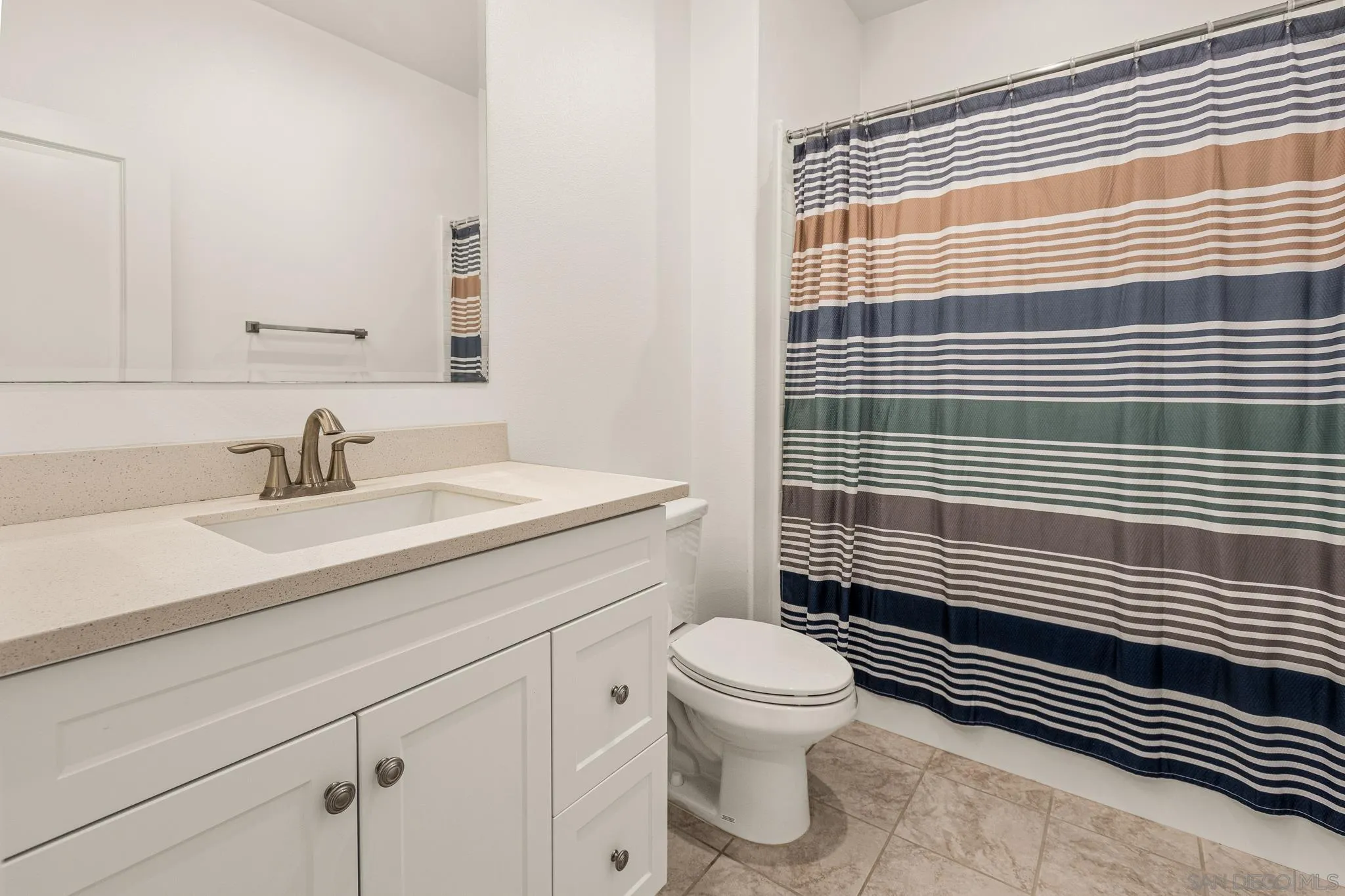 2401 Monroe Place Escondido, CA 92027 - Photo 23 of 23 a bathroom with a sink toilet and shower