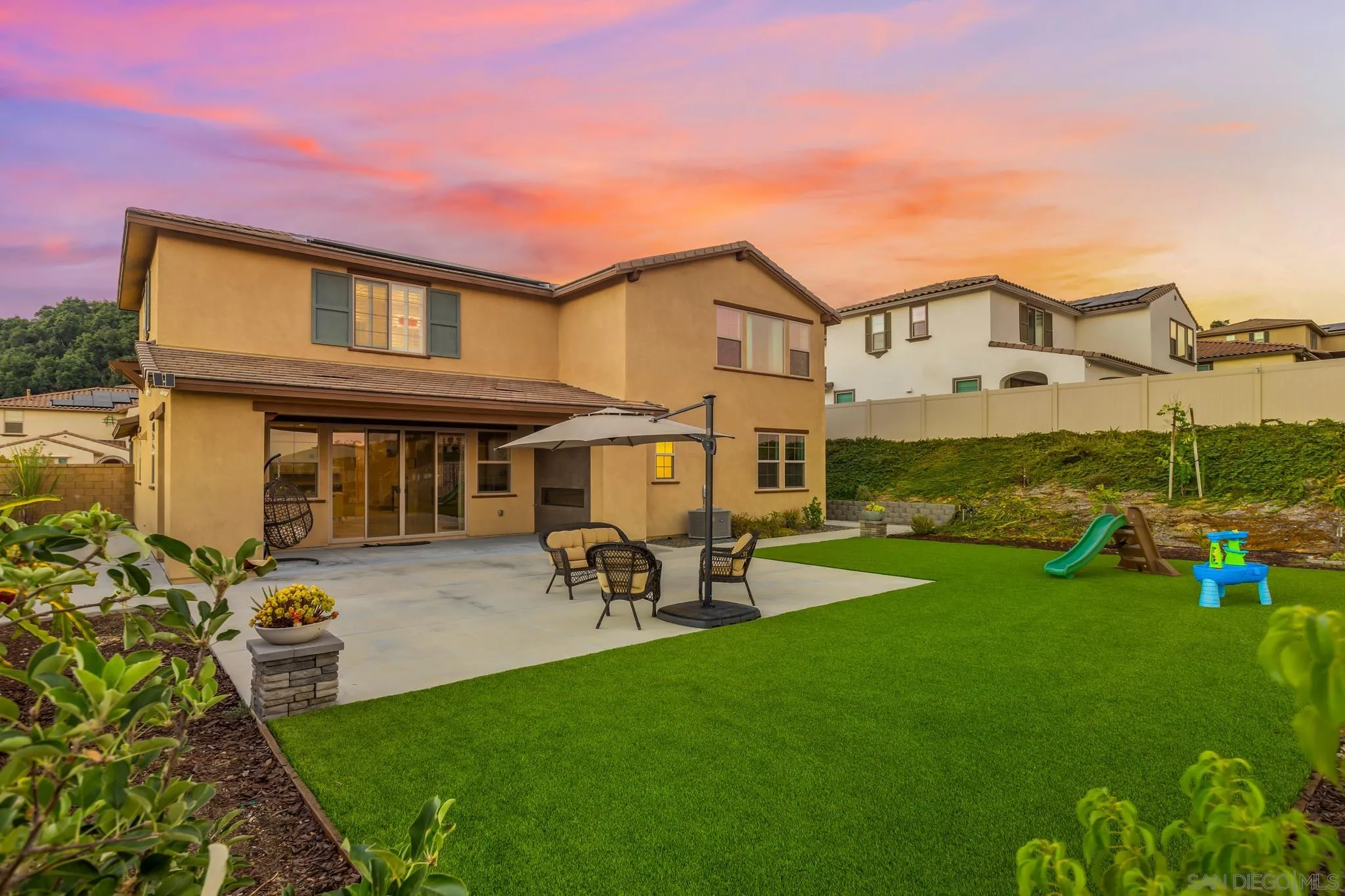 2401 Monroe Place Escondido, CA 92027 - Photo 3 of 23 a view of a house with a yard porch and sitting area