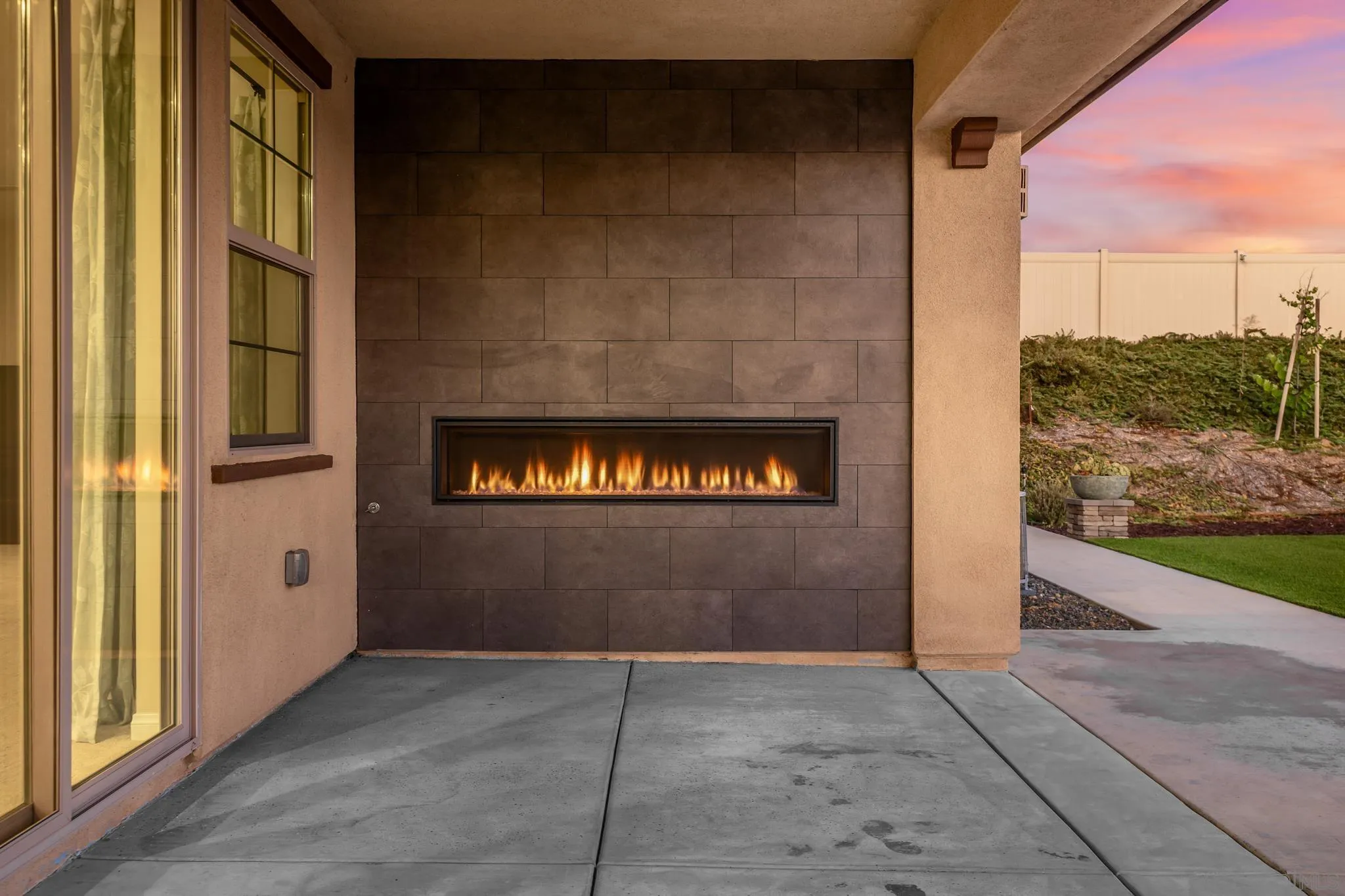 2401 Monroe Place Escondido, CA 92027 - Photo 4 of 23 a view of an empty room with wooden floor and a fireplace