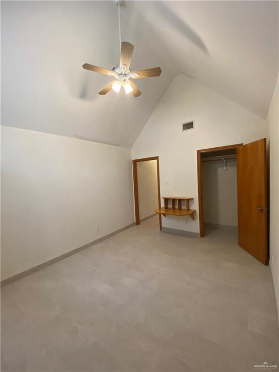 1109 North 47th Street McAllen, TX 78501 - Photo 11 of 21 an empty room with chandelier fan