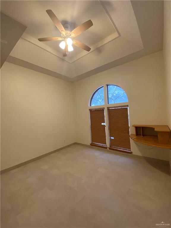 1109 North 47th Street McAllen, TX 78501 - Photo 19 of 21 an empty room with a ceiling fan and fan