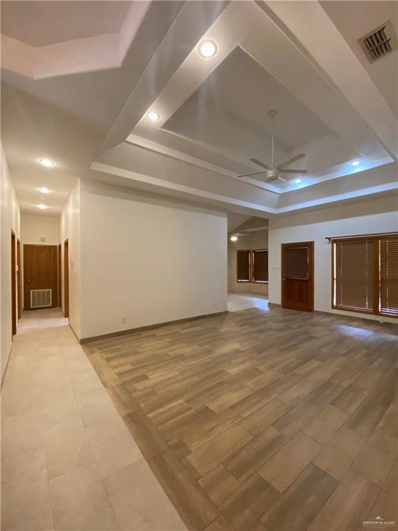 1109 North 47th Street McAllen, TX 78501 - Photo 4 of 21 a view of an empty room with wooden floor