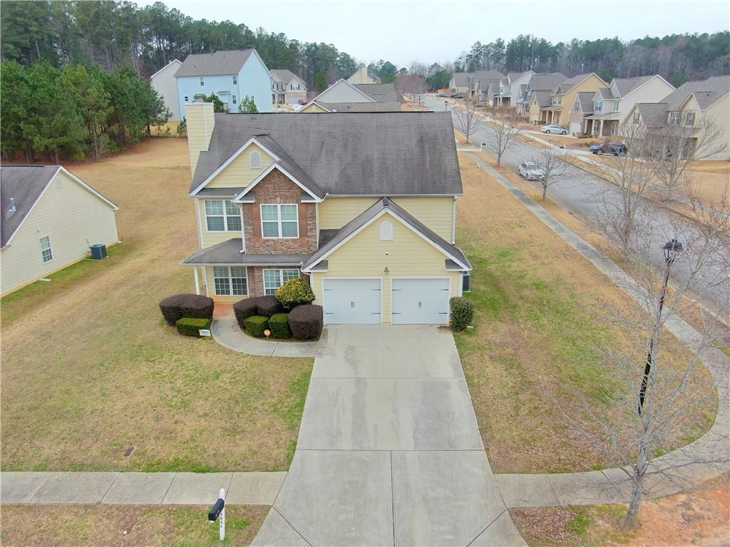 5651 Valley Loop Fairburn, GA 30213 - Photo 1 of 1 an aerial view of a house with a garden