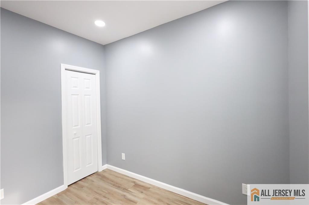 397 Washington Street Perth Amboy, NJ 08861 - Photo 3 of 8 a view of an empty room
