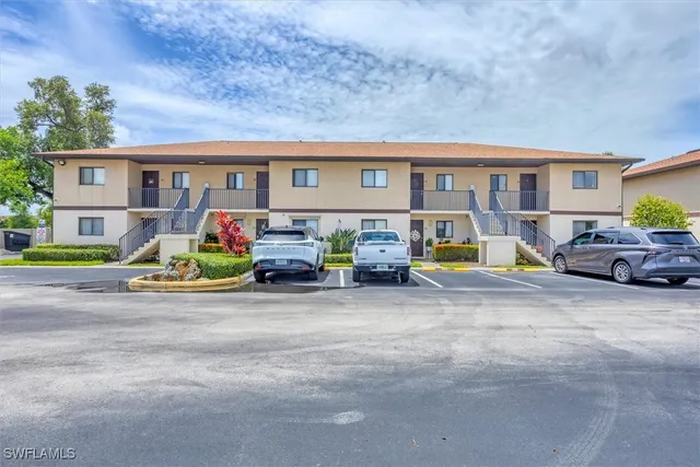 a view of pool with outdoor seating
