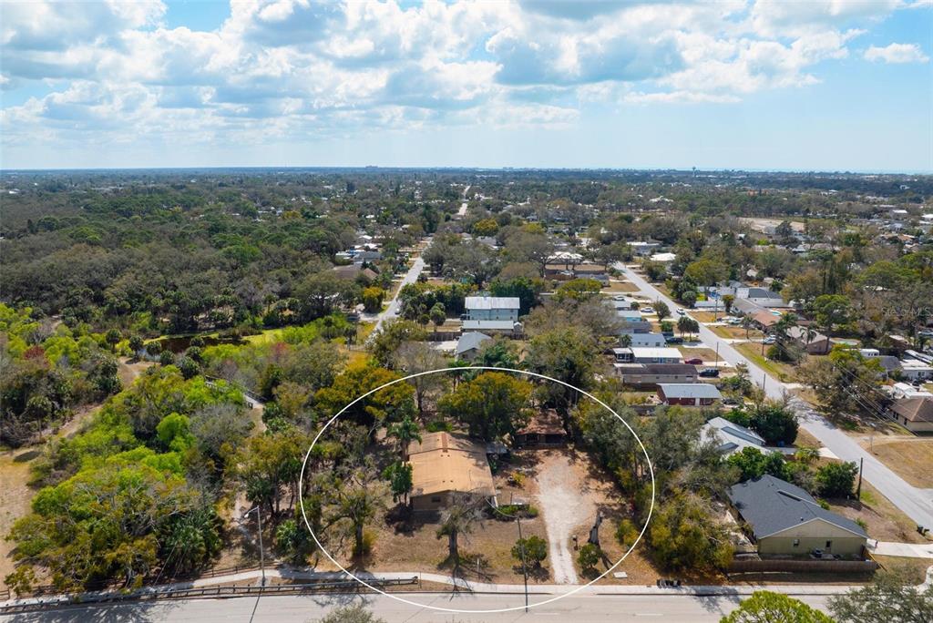 3034 Proctor Road Sarasota, FL 34231 - Photo 13 of 22 an aerial view of multiple house