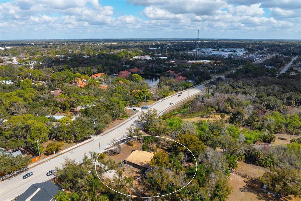 3034 Proctor Road Sarasota, FL 34231 - Photo 20 of 22 a view of a lake from a balcony