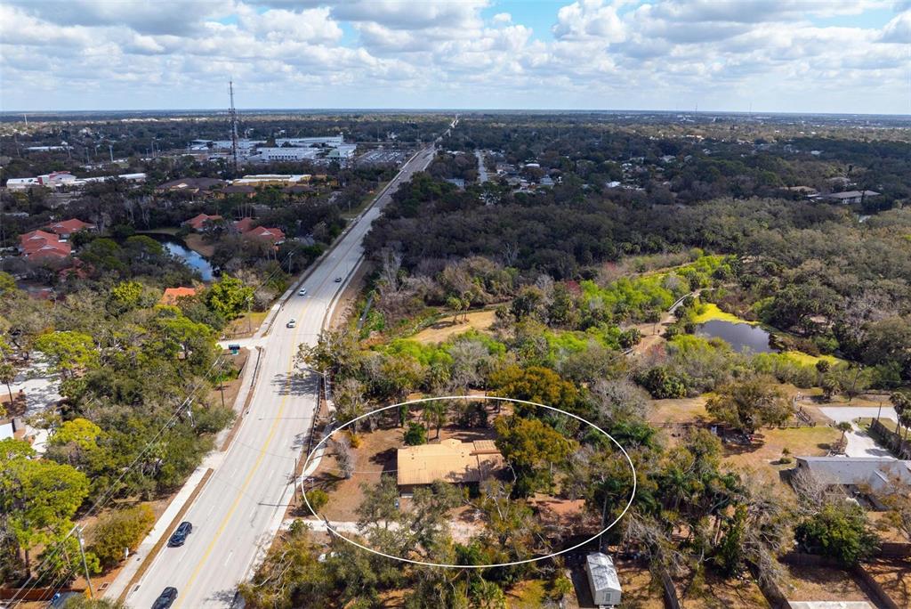 3034 Proctor Road Sarasota, FL 34231 - Photo 21 of 22 an aerial view of residential houses with outdoor space