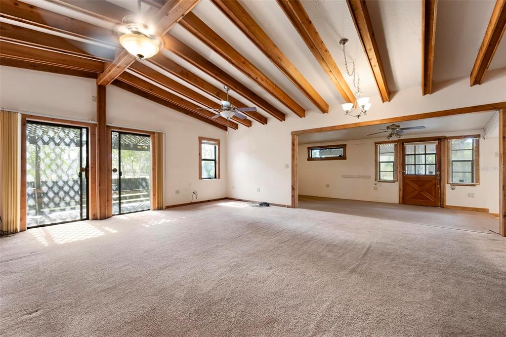 3034 Proctor Road Sarasota, FL 34231 - Photo 5 of 22 a view of an empty room with a window