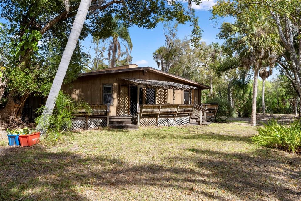 3034 Proctor Road Sarasota, FL 34231 - Photo 9 of 22 a view of a house with backyard