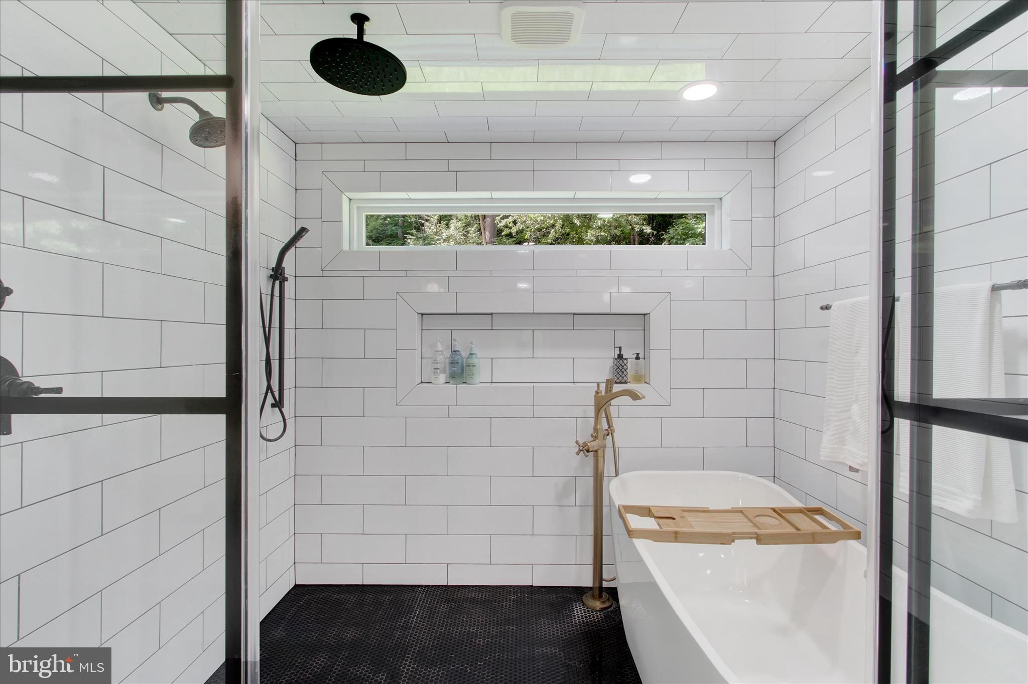 1855 Westwood Road York, PA 17403 - Photo 28 of 60 a bathroom with a bathtub and shower