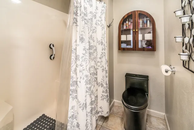 a close view of a toilet in the bathroom