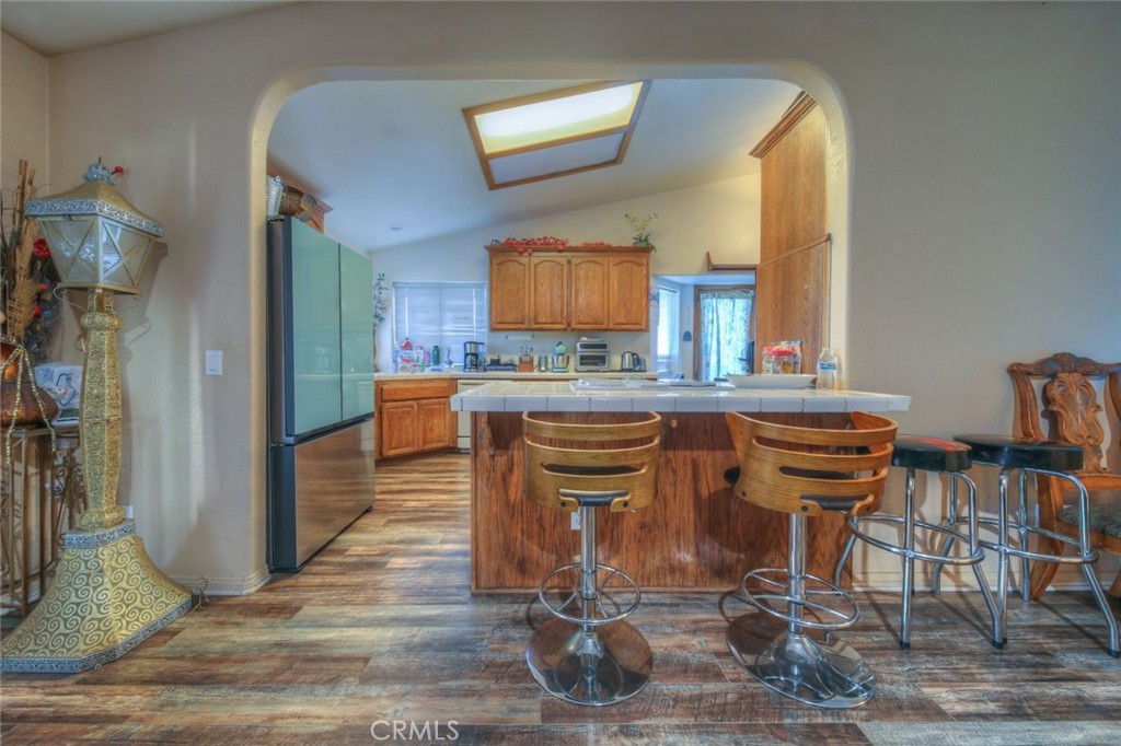 57775 Bailey Road Anza, CA 92539 - Photo 14 of 55 a kitchen with stainless steel appliances granite countertop a stove a sink and a refrigerator