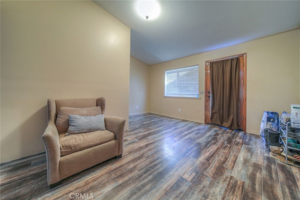 57775 Bailey Road Anza, CA 92539 - Photo 23 of 55 a living room with furniture and a wooden floor