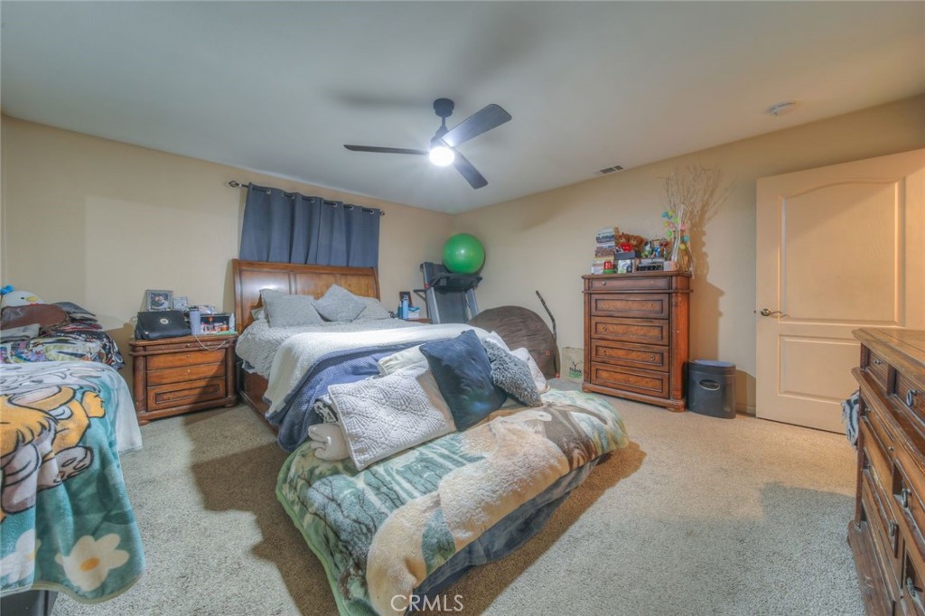 57775 Bailey Road Anza, CA 92539 - Photo 29 of 55 a bedroom with a bed and a walk in closet