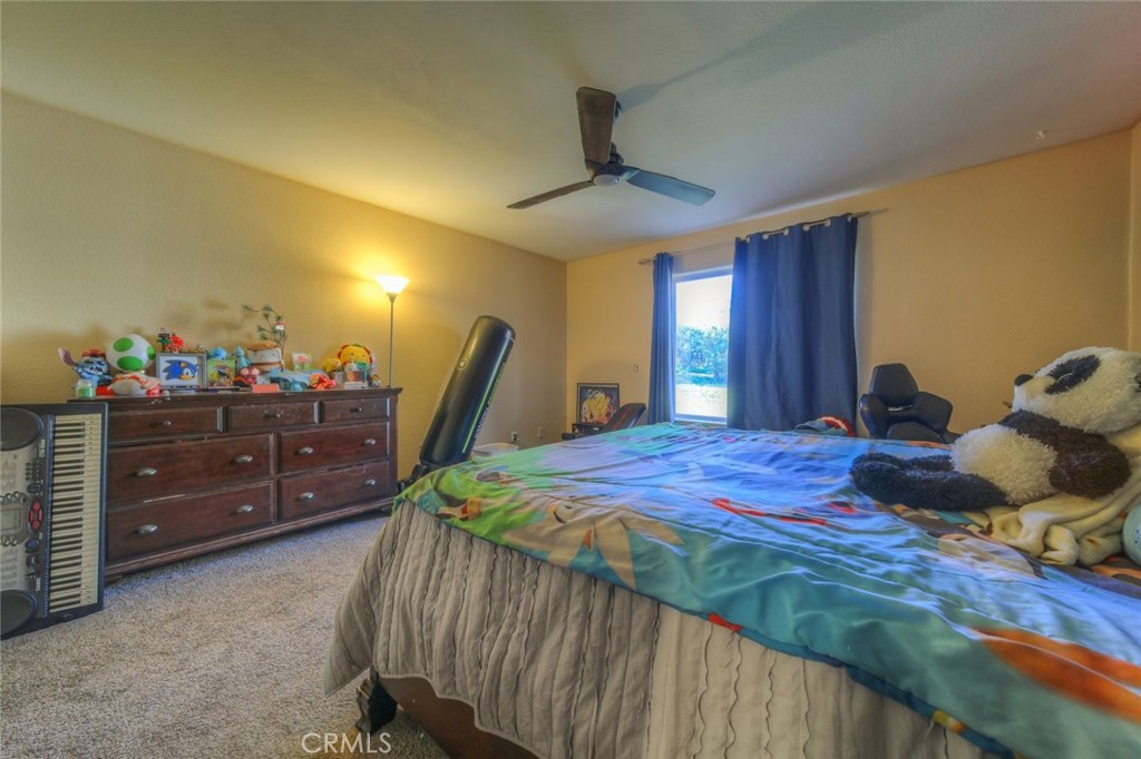 57775 Bailey Road Anza, CA 92539 - Photo 30 of 55 a bed room with a bed and a dresser