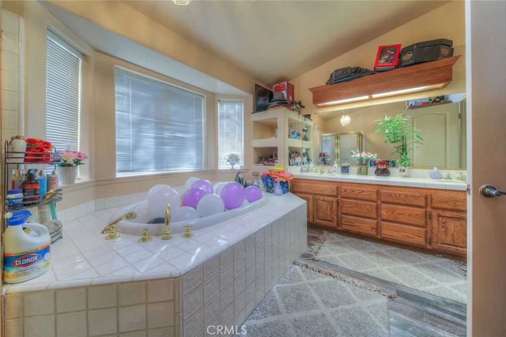 57775 Bailey Road Anza, CA 92539 - Photo 37 of 55 a living room with furniture and a floor to ceiling window