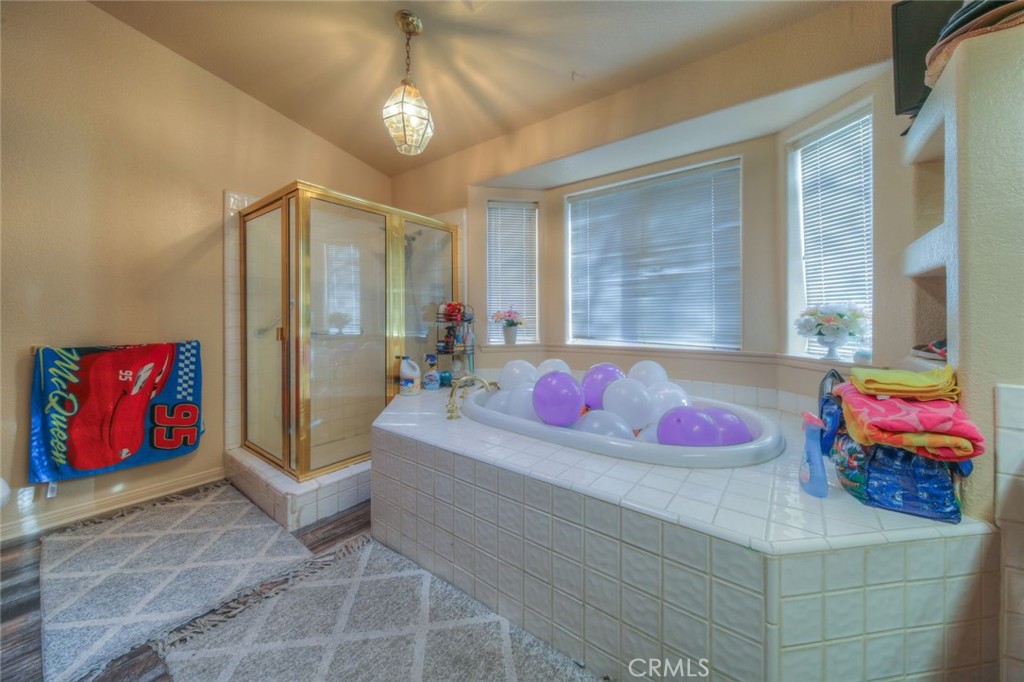 57775 Bailey Road Anza, CA 92539 - Photo 38 of 55 a living room with furniture and a chandelier