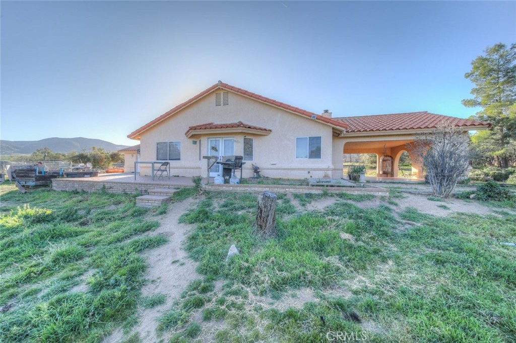 57775 Bailey Road Anza, CA 92539 - Photo 46 of 55 a front view of a house with garden