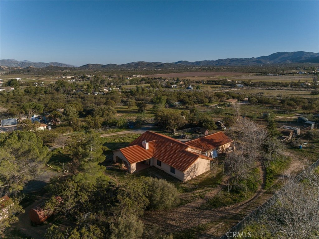 57775 Bailey Road Anza, CA 92539 - Photo 49 of 55 an aerial view of house with yard and mountain view in back