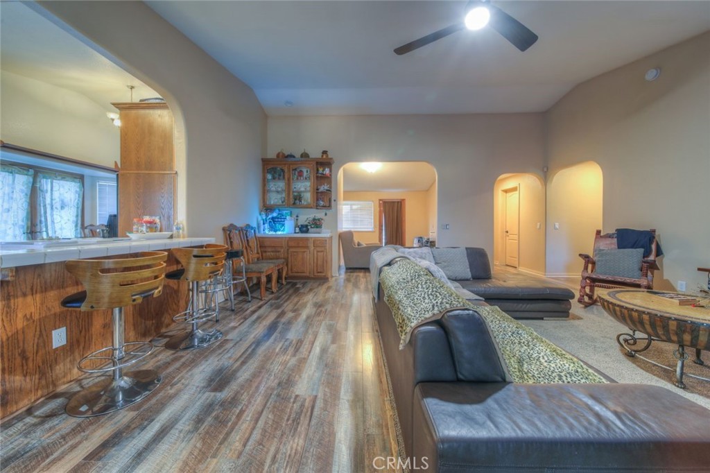 57775 Bailey Road Anza, CA 92539 - Photo 9 of 55 a living room with furniture and a wooden floor