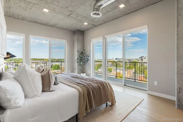 a living room with kitchen island furniture and a mirror