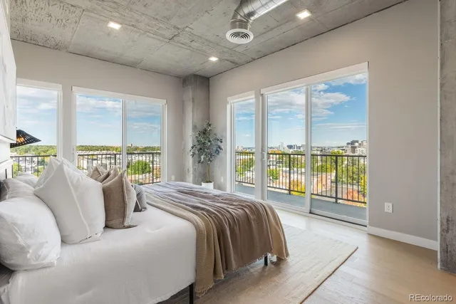 a living room with kitchen island furniture and a mirror