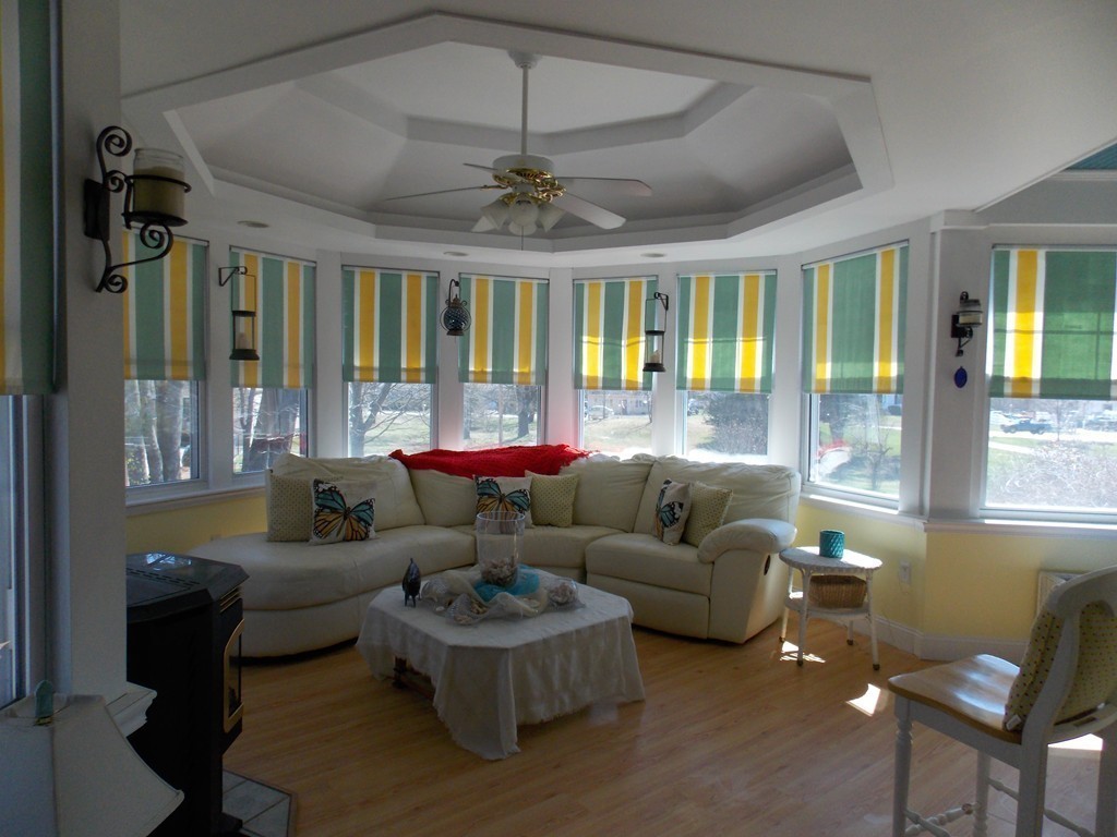 79 Haverhill Road Amesbury, MA 01913 - Photo 13 of 25 a living room with furniture and a large window