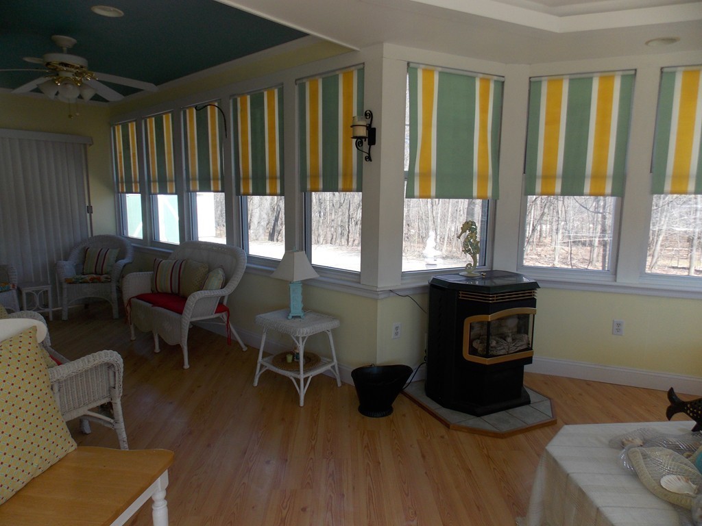79 Haverhill Road Amesbury, MA 01913 - Photo 15 of 25 a living room with furniture and a window