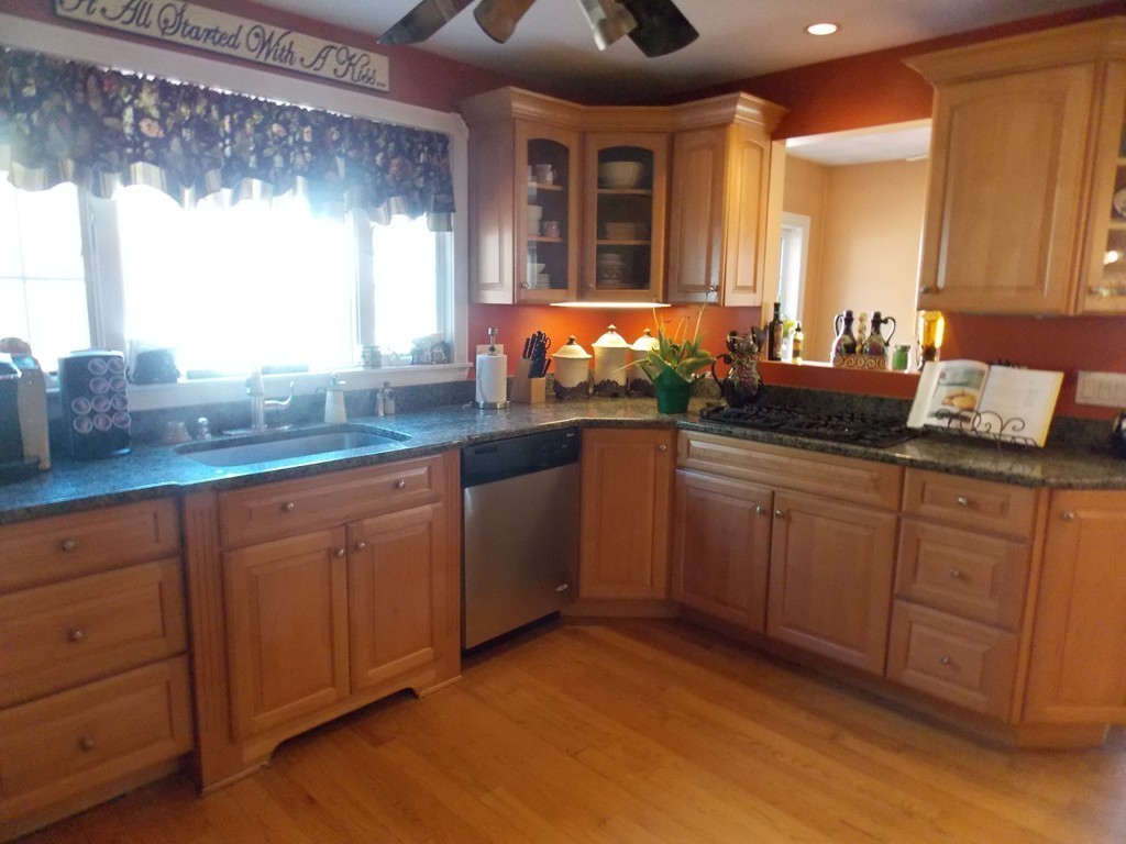 79 Haverhill Road Amesbury, MA 01913 - Photo 4 of 25 a spacious bathroom with a granite countertop sink and a mirror