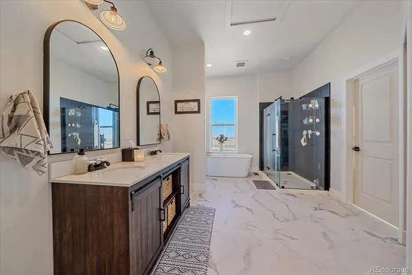a bathroom with a double vanity sink and a mirror