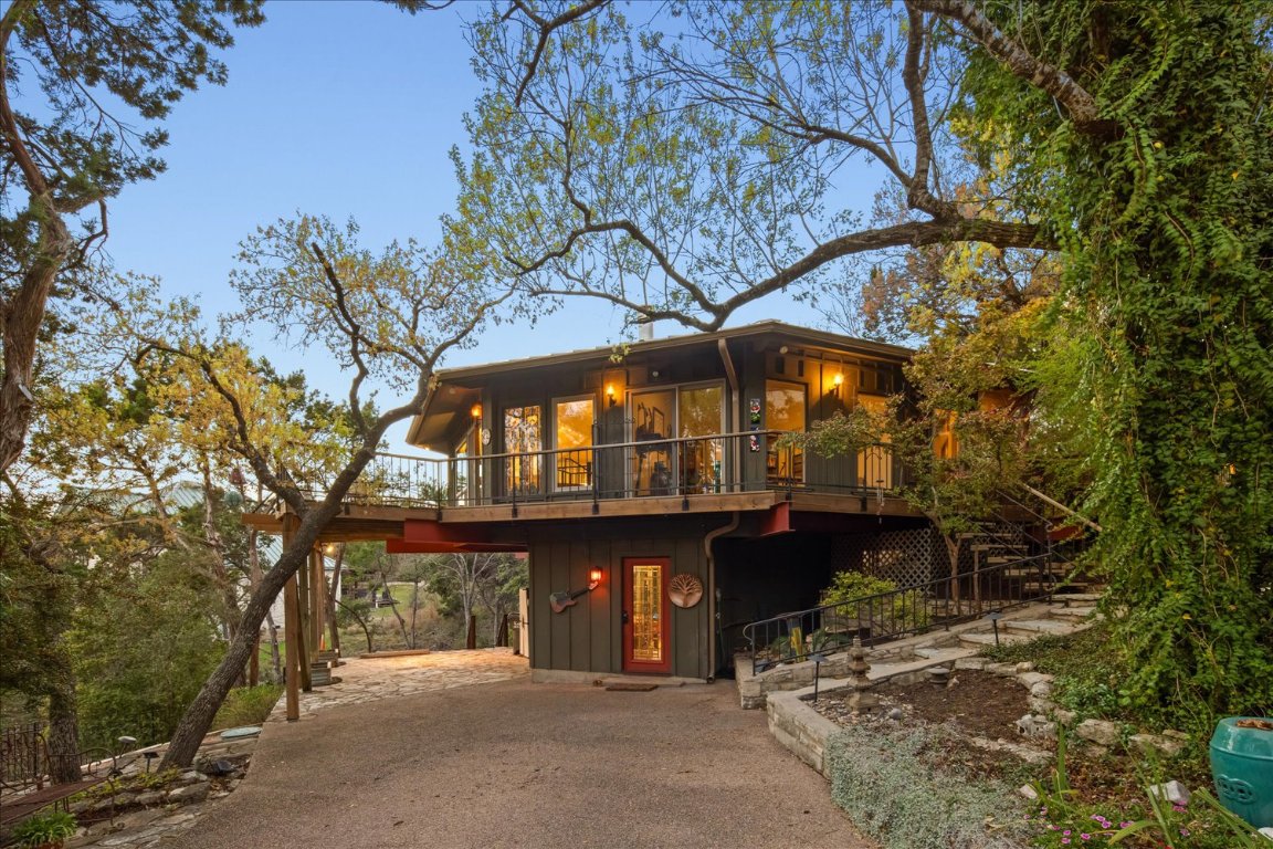 1700 Wild Basin Ledge Austin, TX 78746 - Photo 1 of 1 a view of a house with large trees