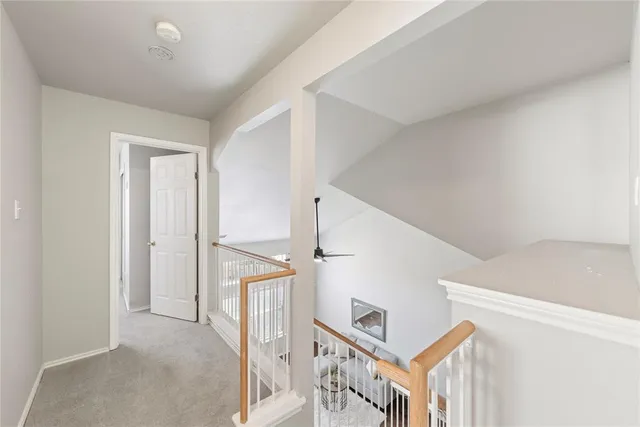 a view of a livingroom with a hall and entryway