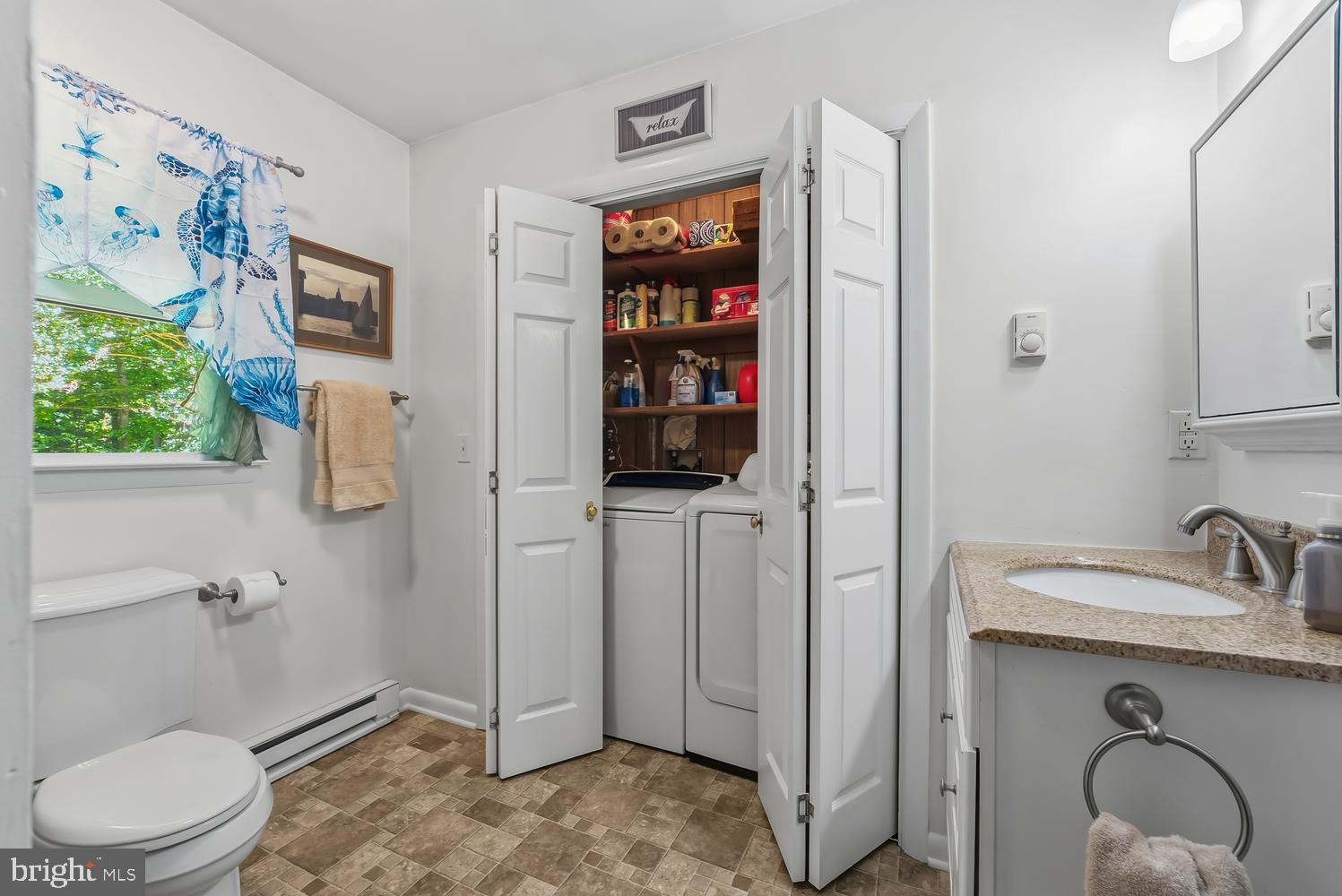 814 Wrights Neck Road Centreville, MD 21617 - Photo 40 of 53 a bathroom with a toilet sink and shower
