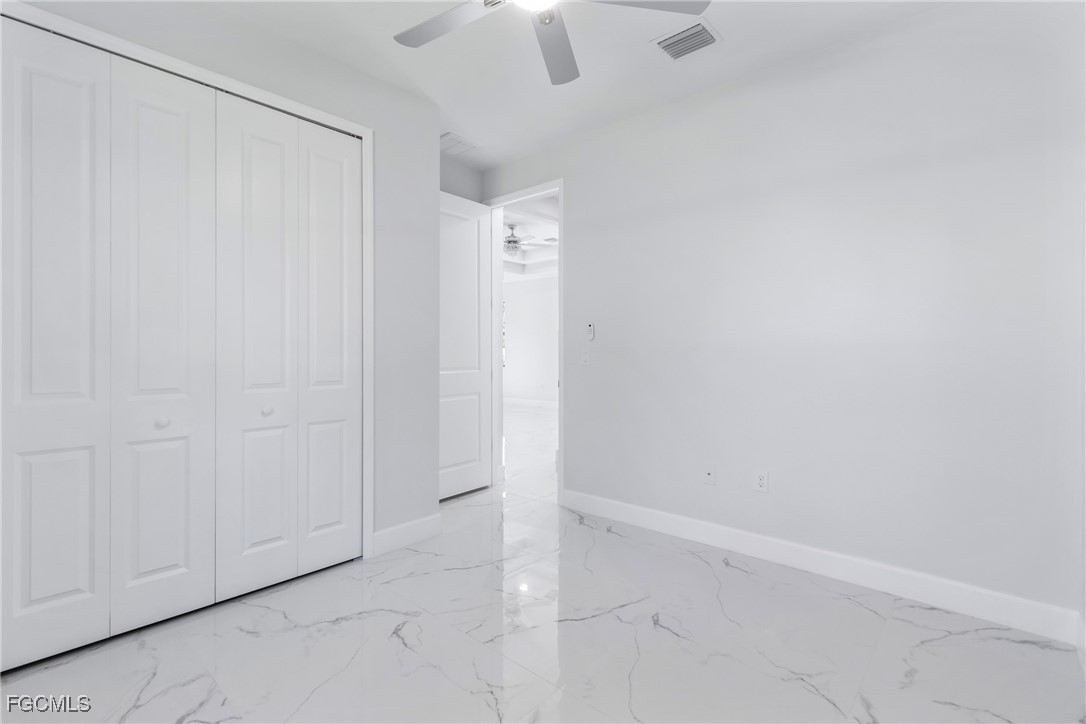 1152 Randolph Street Lehigh Acres, FL 33974 - Photo 31 of 50 a view of an empty room