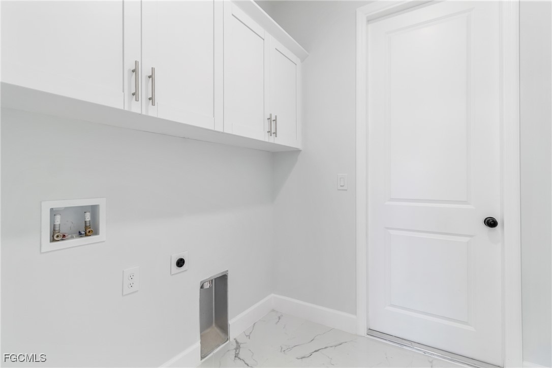1152 Randolph Street Lehigh Acres, FL 33974 - Photo 32 of 50 a view of room with cabinets