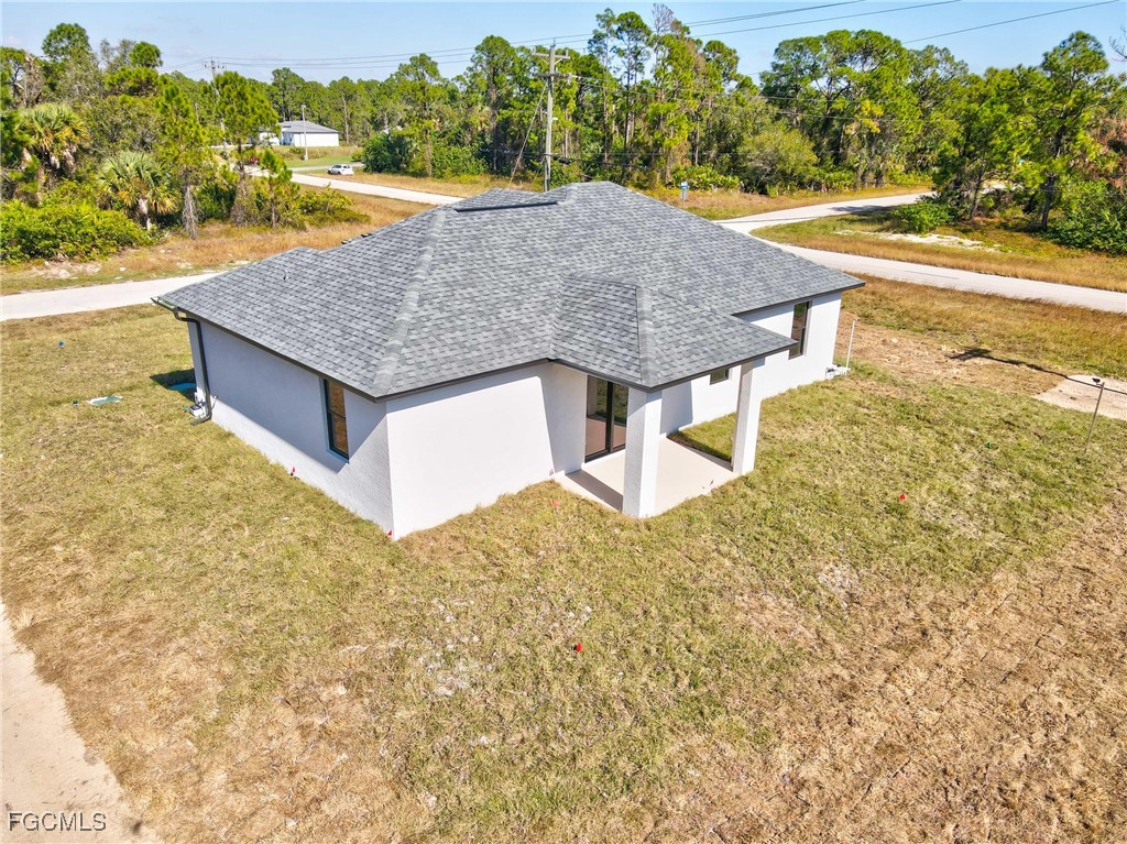 1152 Randolph Street Lehigh Acres, FL 33974 - Photo 41 of 50 a view of a swimming pool with an outdoor space