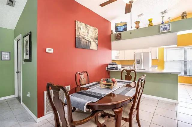a view of a dining room with furniture