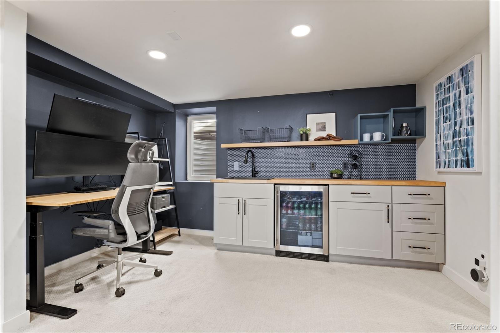 1247 Harrison Street Denver, CO 80206 - Photo 28 of 50 a view of workspace with couch
