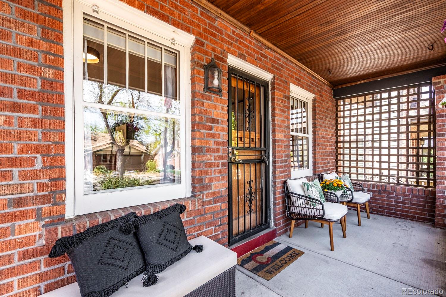 1247 Harrison Street Denver, CO 80206 - Photo 3 of 50 a building outdoor space with seating and furniture