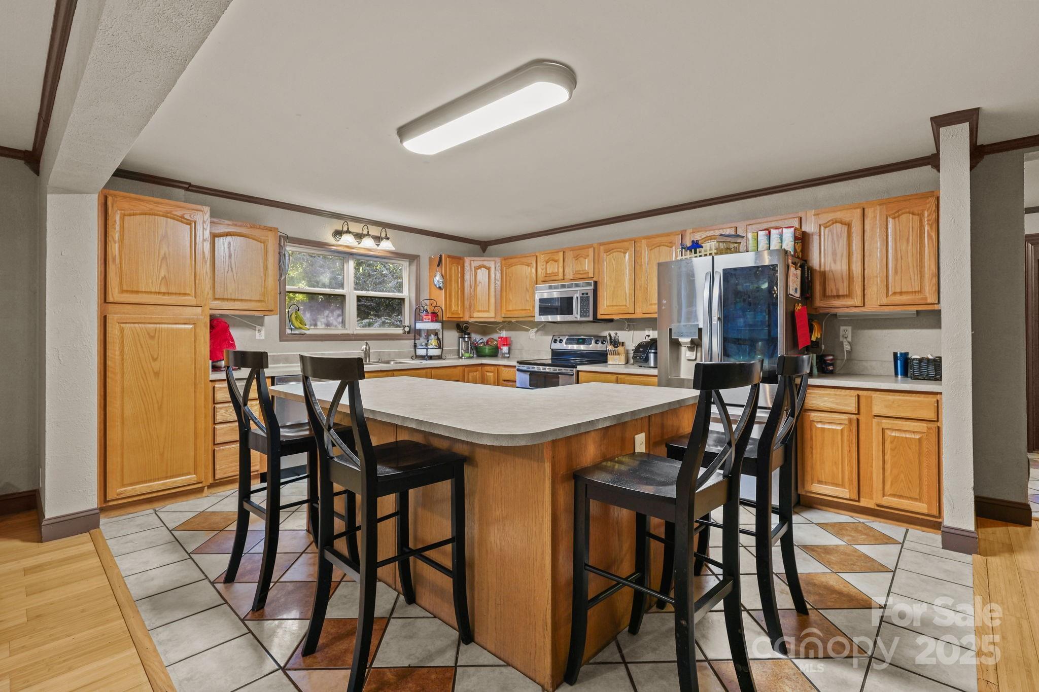 952 Flat Swamp Road Denton, NC 27239 - Photo 12 of 37 a view of a dining room with furniture window and outside view