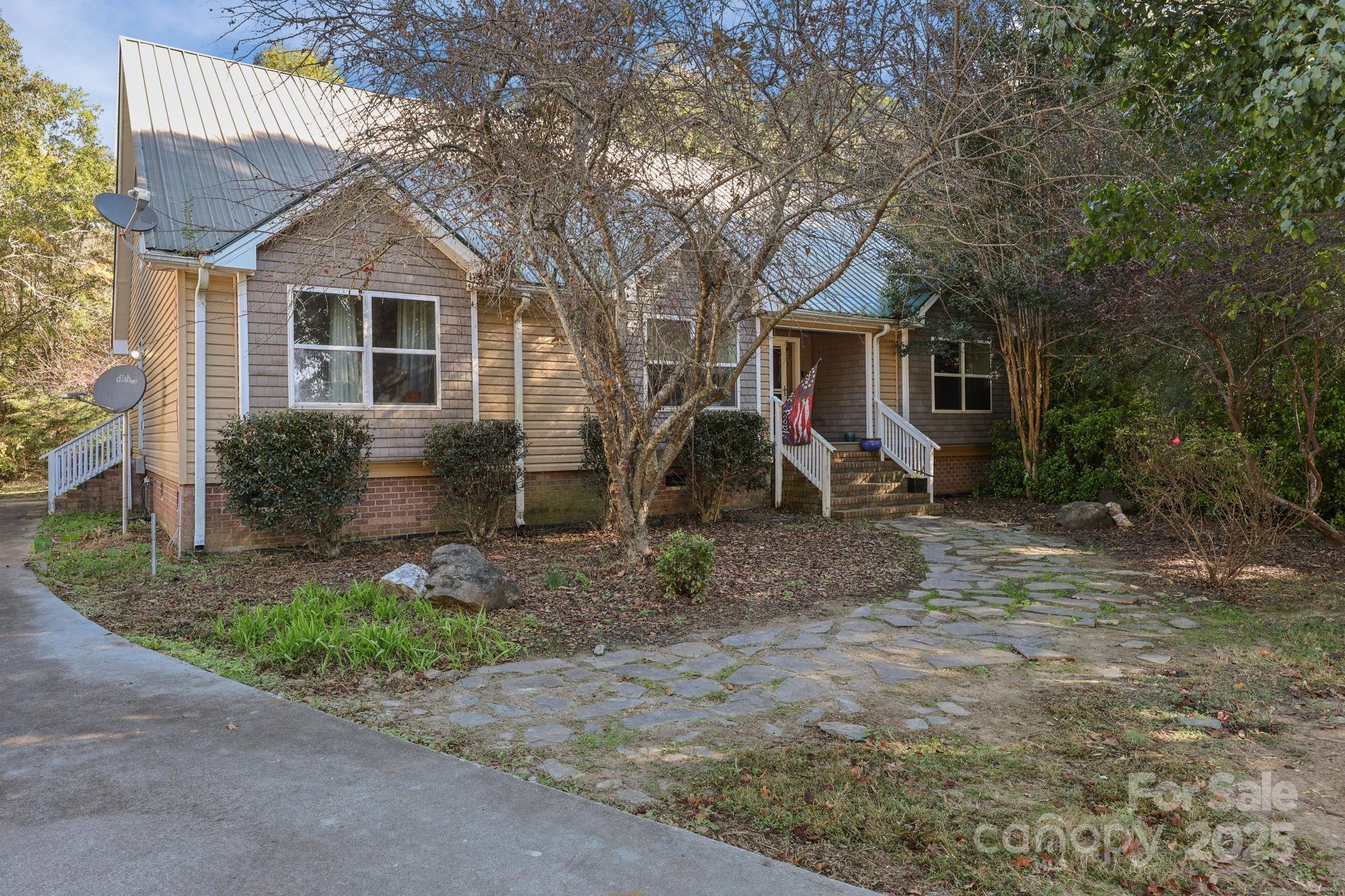 952 Flat Swamp Road Denton, NC 27239 - Photo 34 of 37 a view of a house with backyard