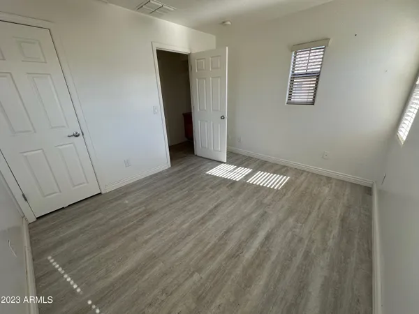 a view of livingroom with hardwood floor and window