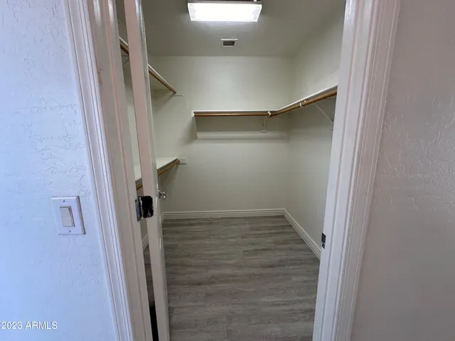 a bathroom with a sink a mirror and a bathtub