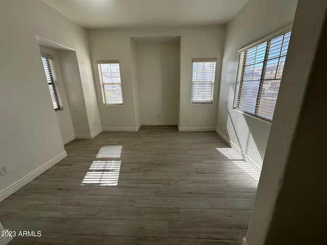 a view of livingroom with hardwood floor and window