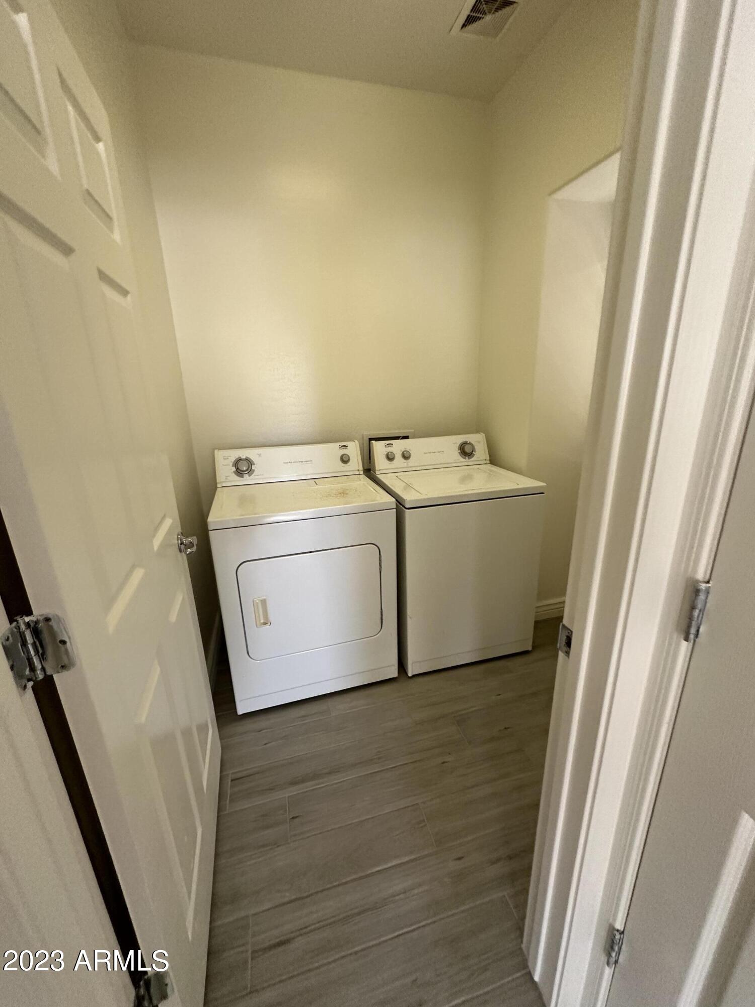 4734 East Olney Avenue Gilbert, AZ 85234 - Photo 6 of 26 a utility room with dryer and washer