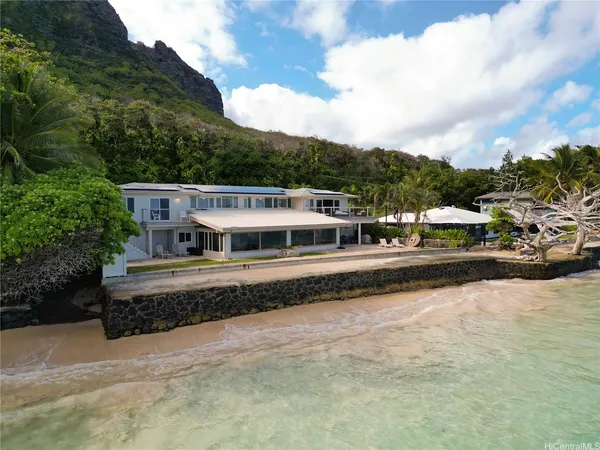 a view of a house with a ocean view