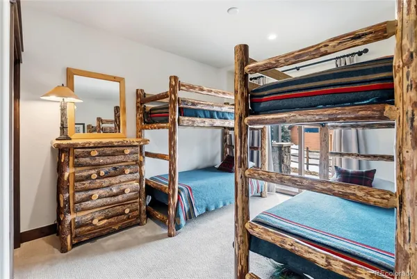 a room with furniture and stairs